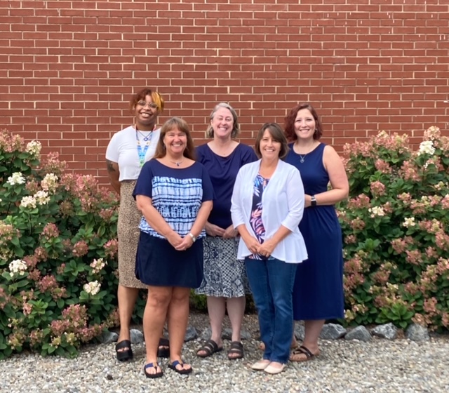 Madison County High School counselors standing outside the high school